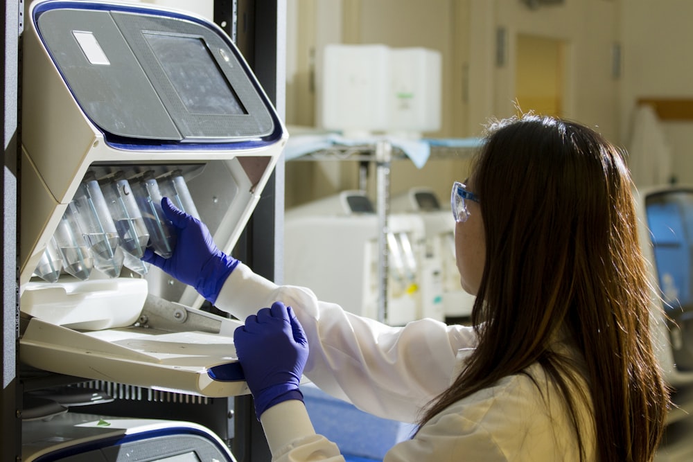 Trained phlebotomist preparing patient samples